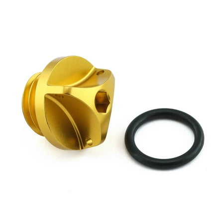 Gold aluminium oil filler cap with a textured surface and a central hexagonal socket, accompanied by a black rubber O-ring for sealing.