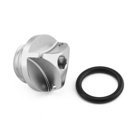 Silver aluminium oil filler cap with a textured grip and a hexagonal socket, accompanied by a black rubber O-ring for sealing, designed for Honda motorcycles.