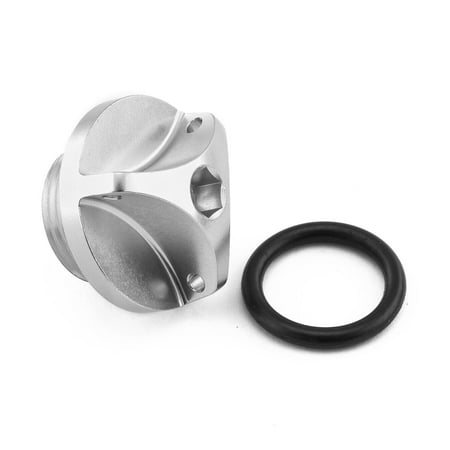 Silver aluminium oil filler cap with a distinctive four-lobed design, featuring a central hole, accompanied by a black rubber O-ring for a secure seal, designed for Suzuki motorcycles.