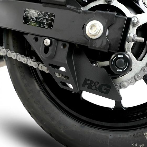 Black R&G Motorcycle Chain & Sprocket Guard made of durable material, featuring the R&G logo, designed to protect the chain and sprocket area on a motorcycle.
