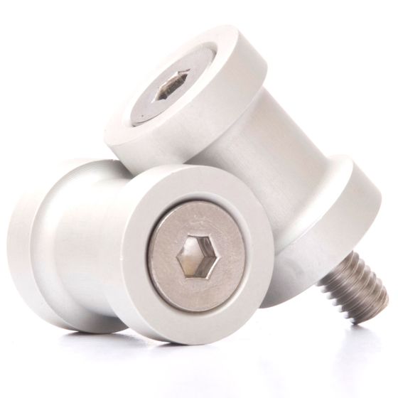 Silver M10 paddock stand bobbins with a smooth aluminum finish, featuring a hexagonal socket for easy installation and a sturdy design for motorcycle support.