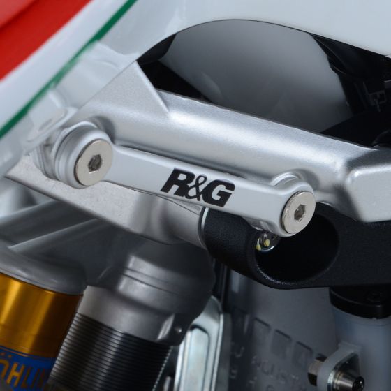 Silver aluminum rear footrest blanking plate kit by R&G, featuring a sleek design with two pieces, showcasing the brand logo and sturdy mounting points.