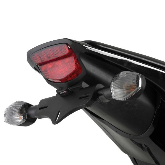 R&G Motorcycle Tail Tidy in black, featuring a sleek design with integrated red taillight and clear turn signals, made of durable plastic for enhanced aesthetics and functionality.