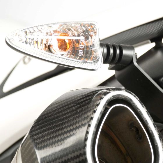 R&G Tail Tidy Indicator Adaptor Kit in black, featuring durable plastic construction, designed for easy installation on motorcycle indicators, with a sleek, modern look.