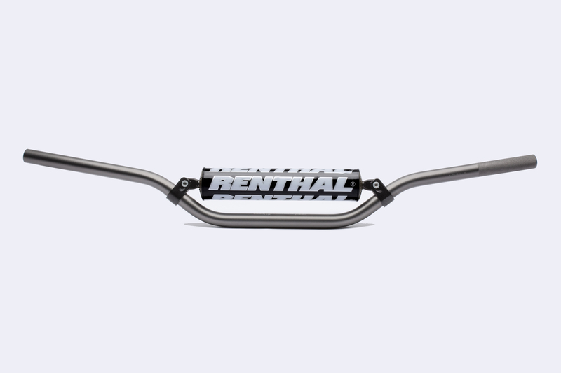 Silver aluminum handlebar with a black central section featuring bold white "RENTHAL" branding, designed for MX/Enduro, measuring 7/8 inches in diameter.