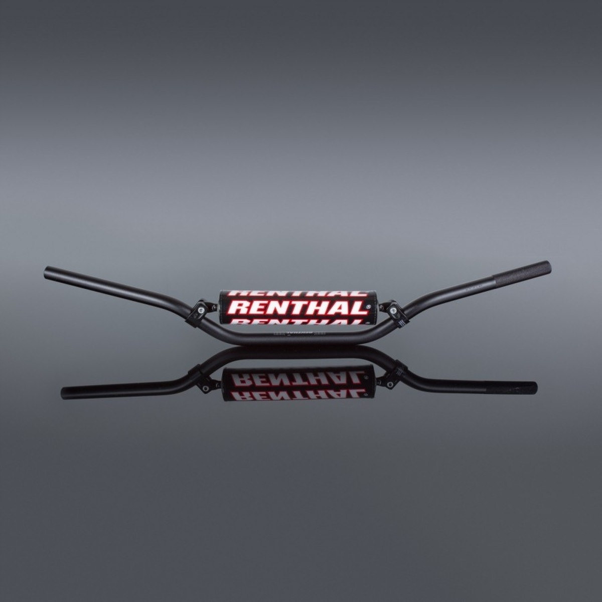 Black Renthal 722 7/8 CR High/Ricky Johnson Bend handlebars featuring a prominent red and white Renthal logo, with a sleek design and sturdy construction.