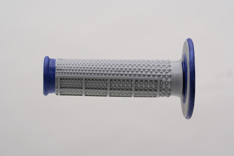 White rubber grip with a half waffle pattern, featuring blue end caps and textured surface for enhanced grip and control, designed for motocross use.