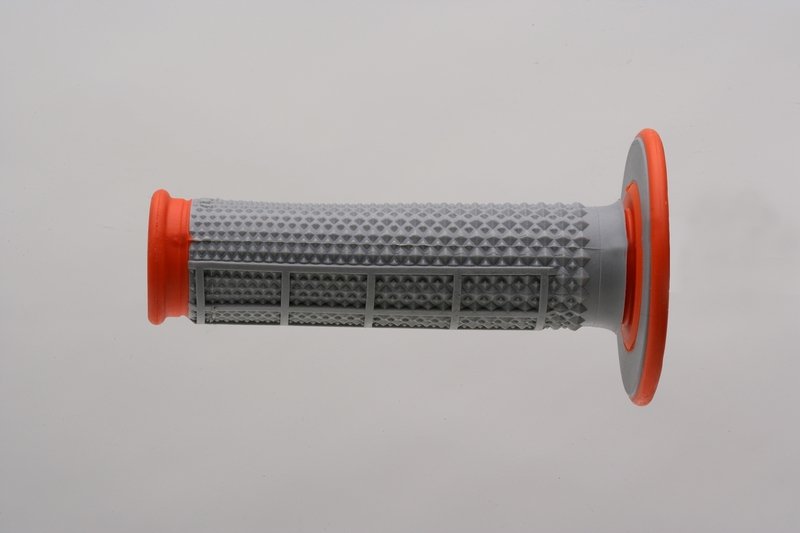 Gray rubber grip with a half waffle texture, featuring orange ends and a tapered design, ideal for motocross use.