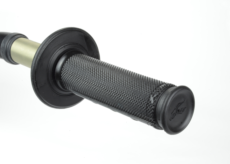 Black rubber grip with a half waffle texture, featuring a smooth end cap and a gold-colored mounting sleeve, designed for enhanced traction and control.