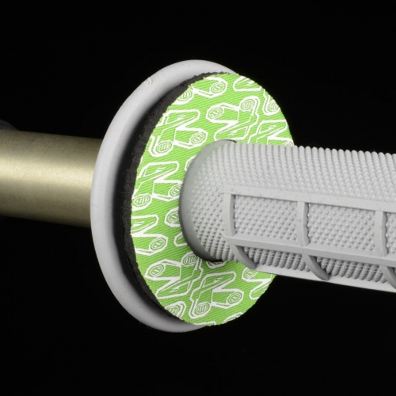 Green rubber donut with a textured white grip attached to a metallic handlebar, featuring a distinctive Renthal logo pattern.