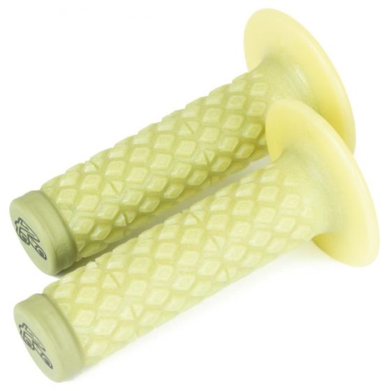 Light yellow aramid grips with a textured diamond pattern and flared ends, featuring Renthal branding on the end caps for enhanced comfort and grip.