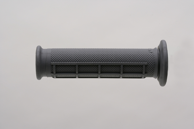 Grey Kevlar dual grip with a half waffle pattern, featuring textured surfaces for enhanced grip and comfort, designed for motorcycle handlebars.