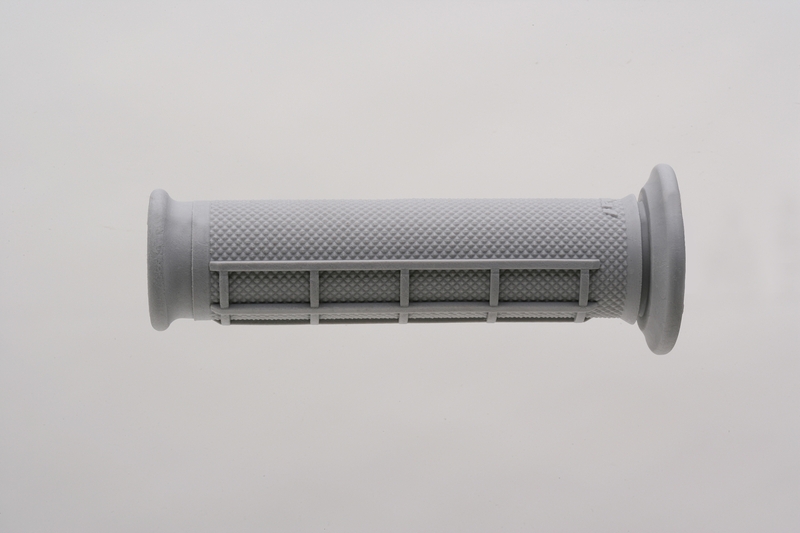 Gray half waffle ATV grip by Renthal, featuring a textured surface for improved grip and control, with end caps for secure fitting on handlebars.