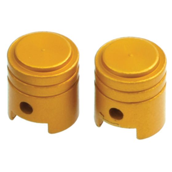 Gold alloy valve caps in a piston shape, featuring a smooth top and ribbed design, designed for durability and style.