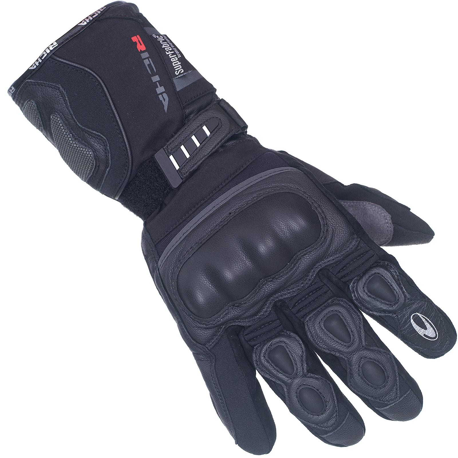 Black motorcycle gloves for women, made from durable material, featuring padded knuckles, a secure wrist strap, and reinforced palm for protection and comfort.