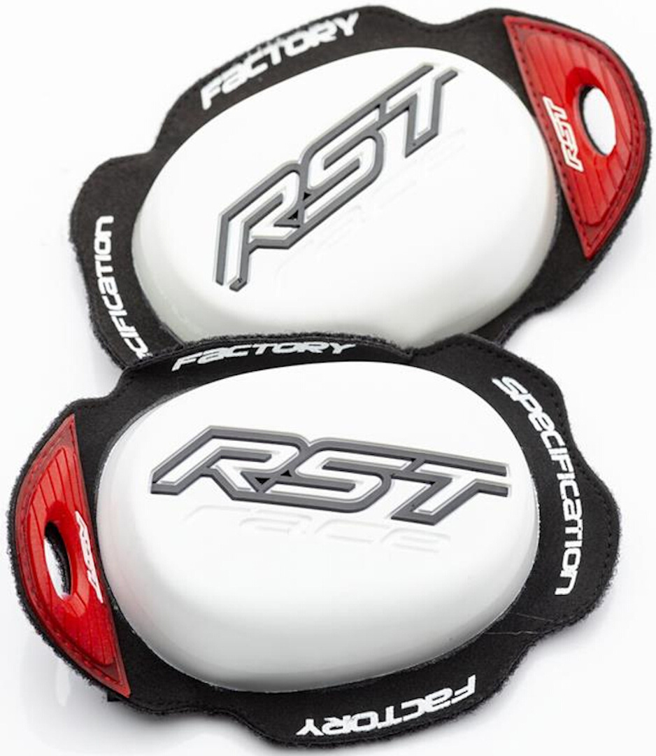 White RST Factory knee sliders with a sleek design, featuring a prominent silver RST logo and red accents on the edges for enhanced visibility and performance.