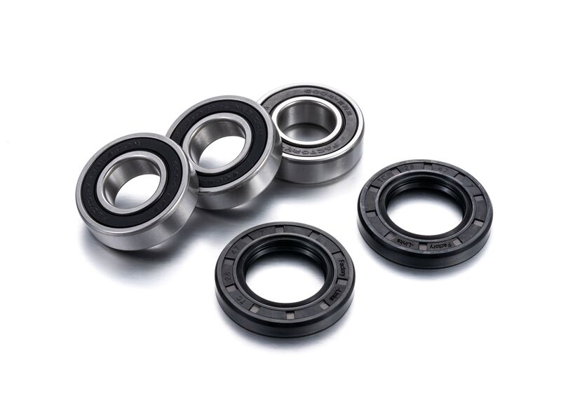 Rear wheel bearing kit from Factory Links featuring three silver metal bearings and two black rubber seals, designed for durability and performance in automotive applications.