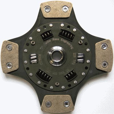 Black and metallic clutch plate with four arms, featuring 18 teeth, a central hub, and gold friction pads, measuring 228mm in diameter.