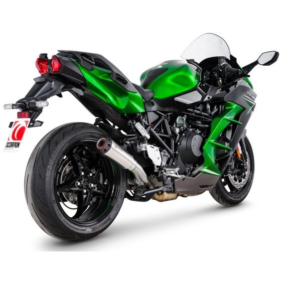 Scorpion Red Power slip-on exhaust features a stainless steel sleeve, sleek design, and is mounted on a green and black motorcycle with a sporty rear profile.