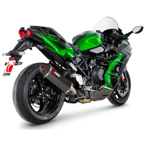 Scorpion Serket Parallel Slip-on Exhaust features a carbon fibre sleeve, sleek black finish, and distinctive red detailing, mounted on a green motorcycle with a sporty design.