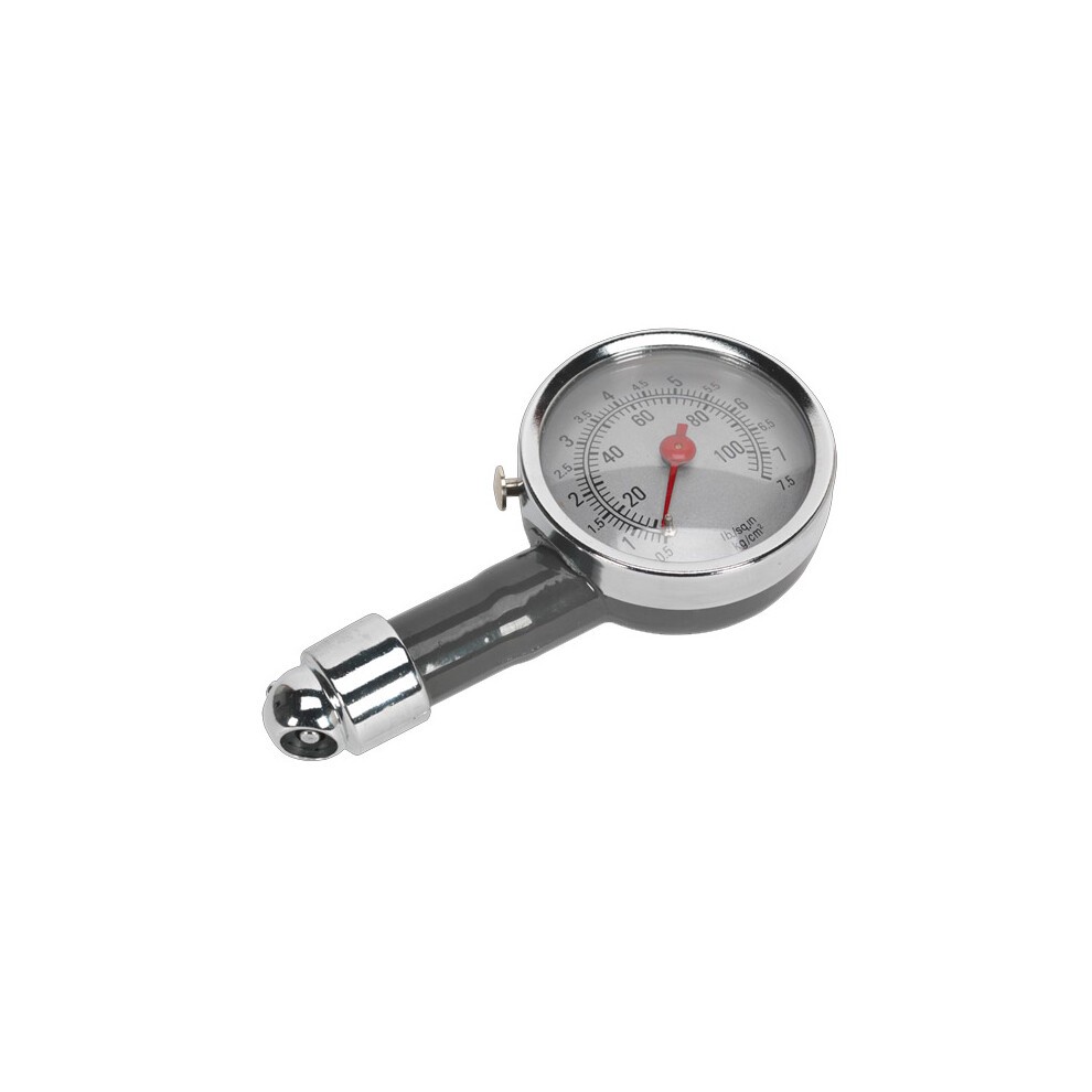 Dial type tyre pressure gauge with a chrome finish, featuring a clear glass dial and a red needle, mounted on a grey plastic handle with a chrome nozzle.