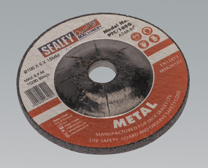 Sealey grinding disc with a diameter of 100mm, 6mm thickness, and 16mm bore, featuring a black and grey abrasive surface with "METAL" label and safety instructions.