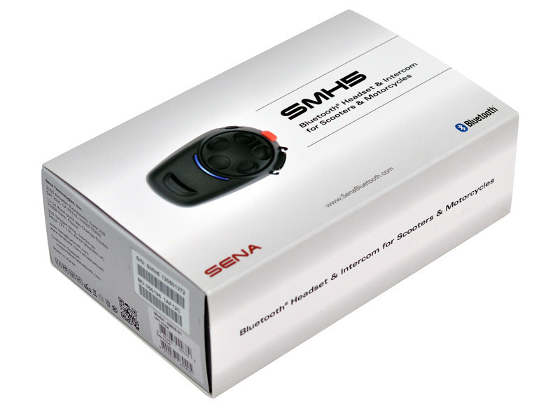 White box featuring the Sena SMH5 Bluetooth Communication System, with a sleek black headset illustration and four control buttons prominently displayed on the front.