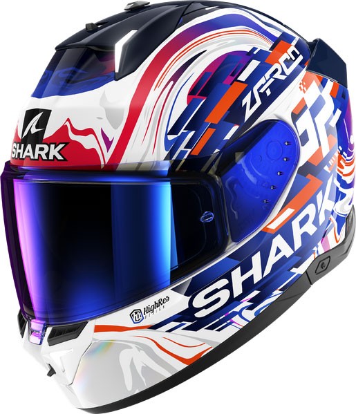 Full face helmet in white, violet, and blue with a glossy finish, featuring bold graphics, a tinted visor, and Shark branding on the side. Size: S.