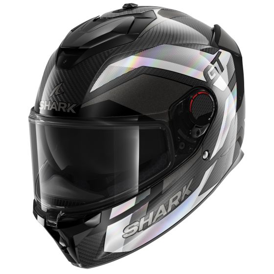 Full face helmet in black, dark grey, and silver with a carbon finish, featuring a clear visor, aerodynamic design, and size XS, branded with the Shark logo.