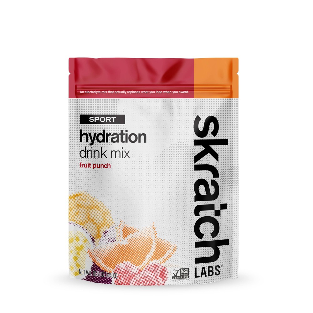 Brightly colored pouch of Skratch Labs Hydration Sport Drink Mix in Fruit Punch flavor, featuring a bold logo and images of fruit on a white and orange background.