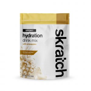 Skratch Labs Sport Hydration Mix in a 1lb bag features a white and gold design with black text, highlighting "hydration drink mix" and "with pineapples."
