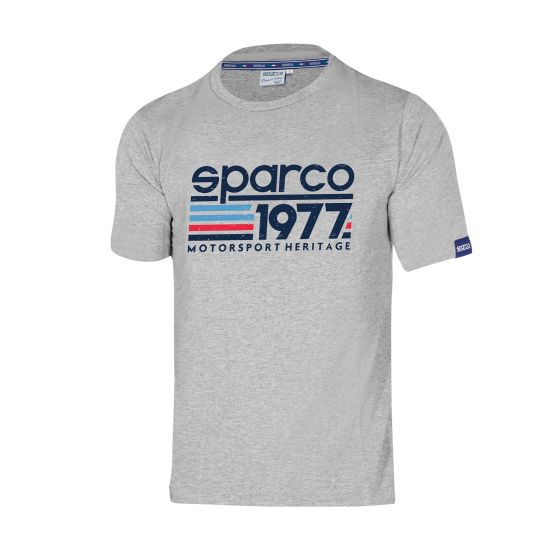Gray cotton t-shirt featuring a bold blue and red "Sparco 1977 Motorsport Heritage" graphic on the front, with a small logo on the sleeve.