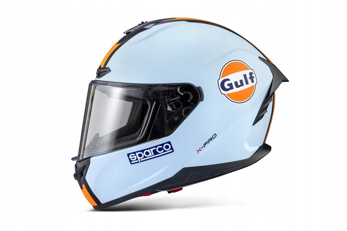 Light blue racing helmet with Gulf logo, Sparco branding, aerodynamic design, and a tinted visor, featuring a sleek finish and modern styling.