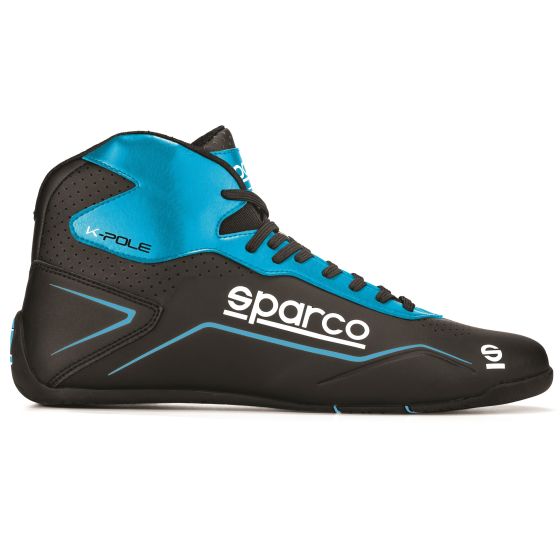 Black kart boots with light blue accents, featuring a high-top design, lace-up front, and Sparco logo on the side, sized UK 1 / EUR 32.