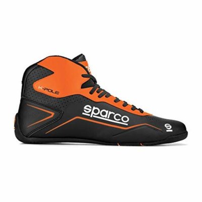 Black kart boots with fluro orange accents, featuring a high-top design, perforated material for breathability, and a prominent white "Sparco" logo on the side.