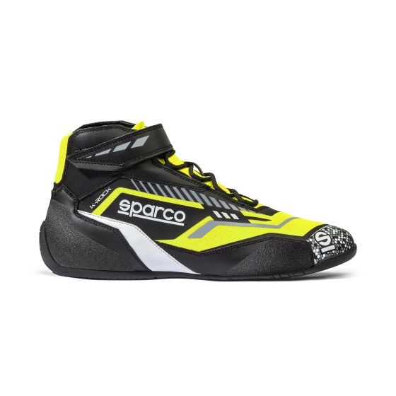 Sparco K-Rock kart boots in black with fluro yellow accents, featuring a high-top design, lace closure, and a reinforced toe for enhanced protection, size UK 11 / EUR 46.