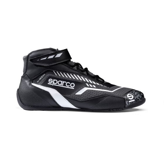 Black and grey Sparco K-Rock kart boots featuring a sleek design, reinforced toe, and adjustable strap, sized UK 10.5 / EUR 45.