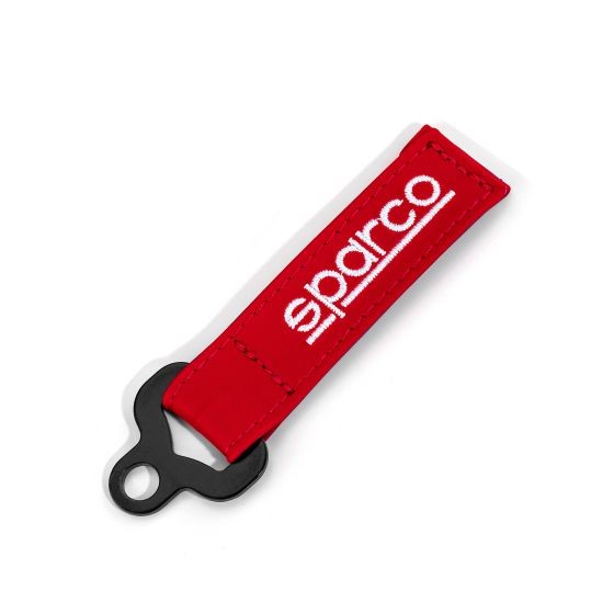 Red leather key fob featuring a black metal attachment and bold white "Sparco" logo, designed for durability and style.