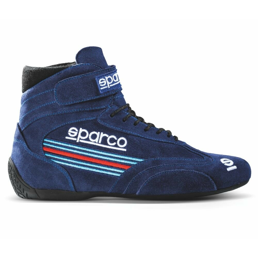 Navy blue racing boots featuring a suede finish, lace-up front, Velcro strap, and colorful stripes with "Sparco" branding, size UK 9 / EUR 43.