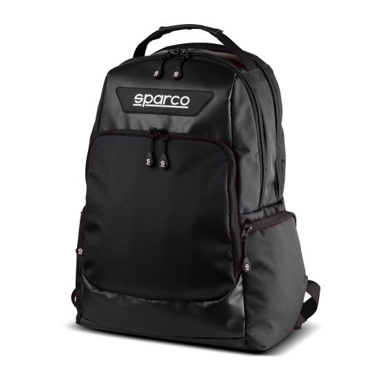 Black Sparco Super Stage rucksack featuring a sleek design, durable material, multiple zippered pockets, and a prominent Sparco logo on the front.