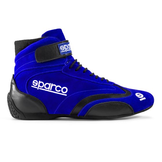 Sparco Top Race Boots in vibrant blue suede with black accents, featuring a high-top design, lace-up front, and adjustable Velcro strap for secure fit.