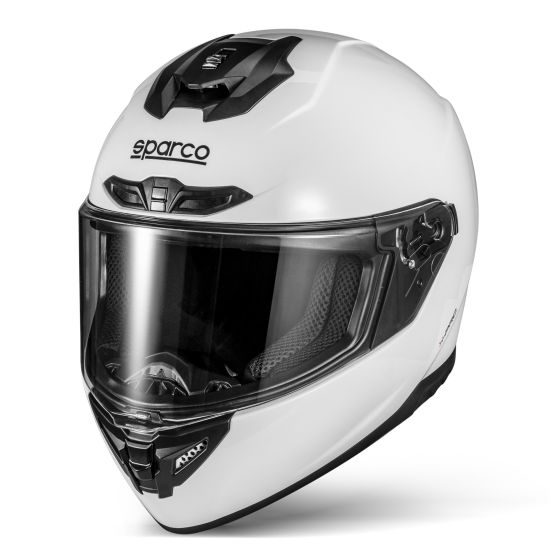 White Sparco X-Pro helmet in size XL, featuring a sleek aerodynamic design, tinted visor, ventilation openings, and a prominent Sparco logo on the front.