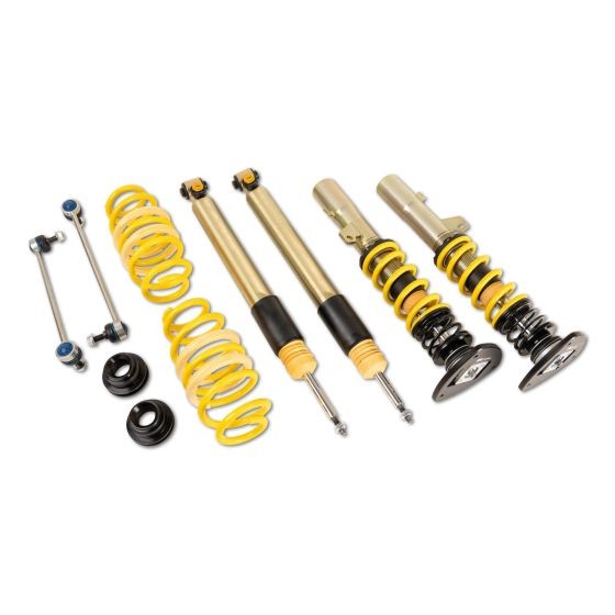 ST Suspension ST XTA Plus 3 Coilover Kit featuring yellow springs, black and gold shock absorbers, and adjustable components for lowering vehicles by 20-40mm.
