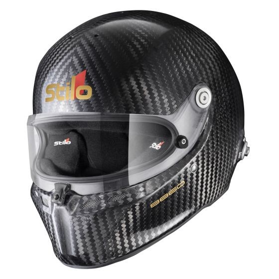 Carbon fiber racing helmet in black with a clear visor, featuring the Stilo logo in red and yellow, designed for safety and performance, size M (57cm).