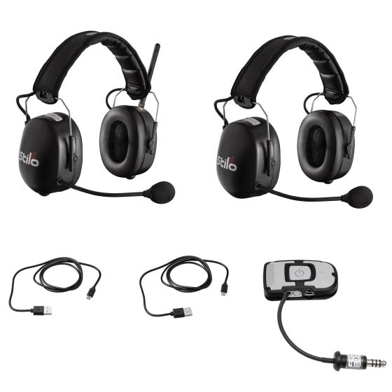 Stilo Verbacom Pit to Car Communication System featuring two black headsets with padded ear cups and microphones, plus a control unit and various connecting cables.