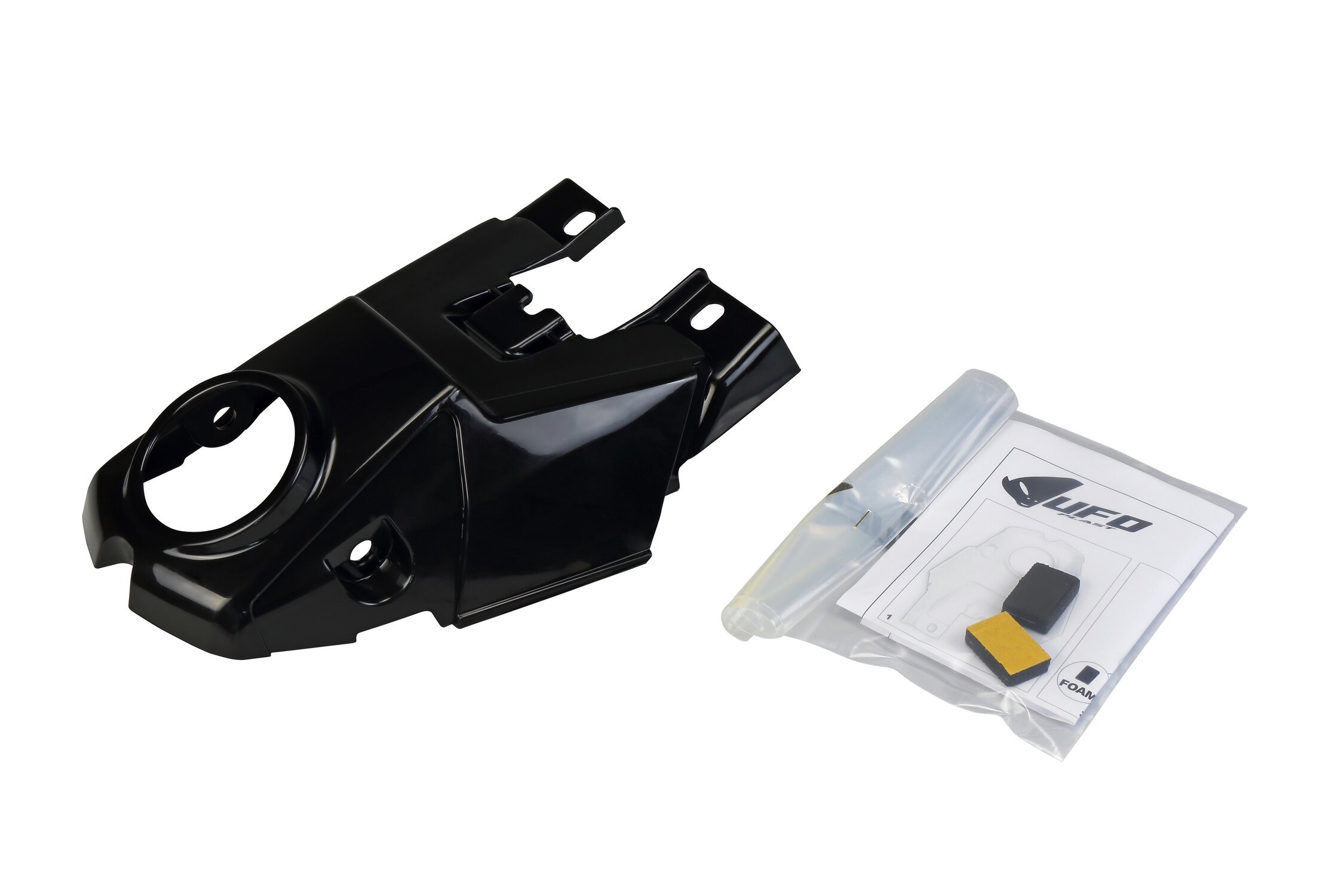 Black UFO tank cover for Suzuki RMZ250 (2019-2025) with a glossy finish, featuring mounting points, and accompanied by installation accessories and instructions.