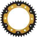 Gold and black rear motorcycle sprocket featuring a durable design with multiple holes for attachment, sharp teeth for optimal performance, and a sleek, modern aesthetic.