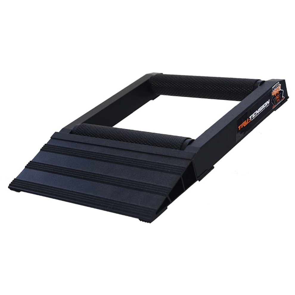 Black plastic wheel roller with a textured surface, featuring a sloped design and Tru-Tension branding on the side, designed for rear wheel support.