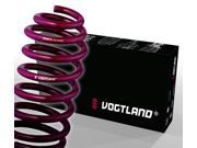 Purple metal lowering spring next to a black box featuring the white and red "Vogtland" logo, designed to lower front by 30mm and rear by 20mm.