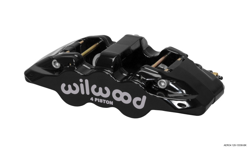 Black Wilwood Aero4 caliper featuring four pistons, designed for 1.10-inch discs, with a sleek finish and prominent white "Wilwood" branding on the side.